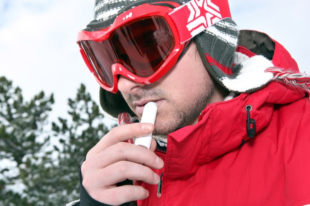 Skiier Applying Chap-stick